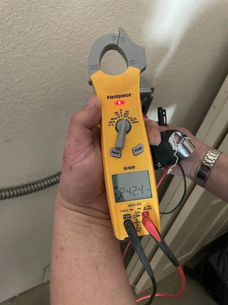 Voltage testing with clamp meter during Ceiling Fan Installation in Smithfield
